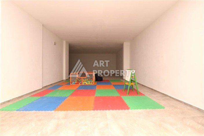 Квартира 1+1 в Махмутларе в новой резиденции, 50 м² - Ракурс 26