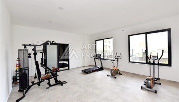 Квартира 1+1 в Махмутларе в новой резиденции, 50 м² - Ракурс 28