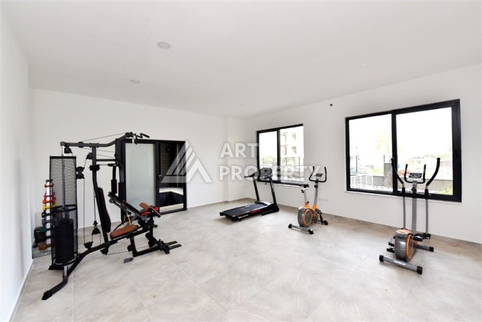 Квартира 1+1 в Махмутларе в новой резиденции, 50 м² - Ракурс 27
