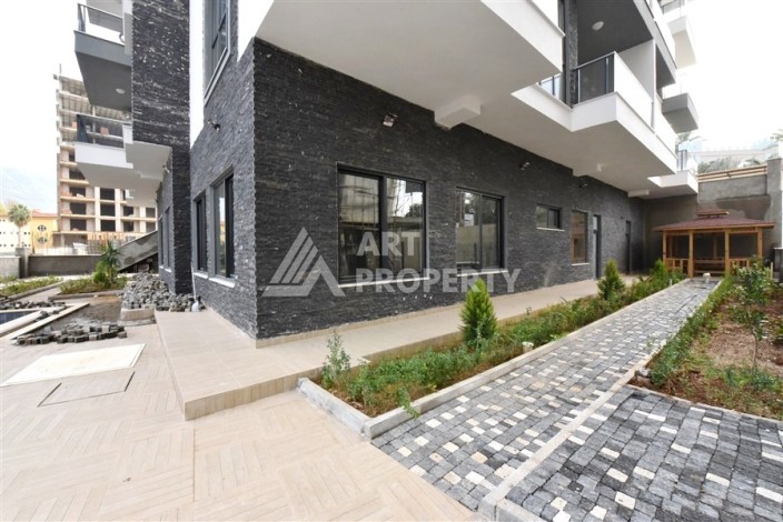Квартира 1+1 в Махмутларе в новой резиденции, 50 м² - Ракурс 30