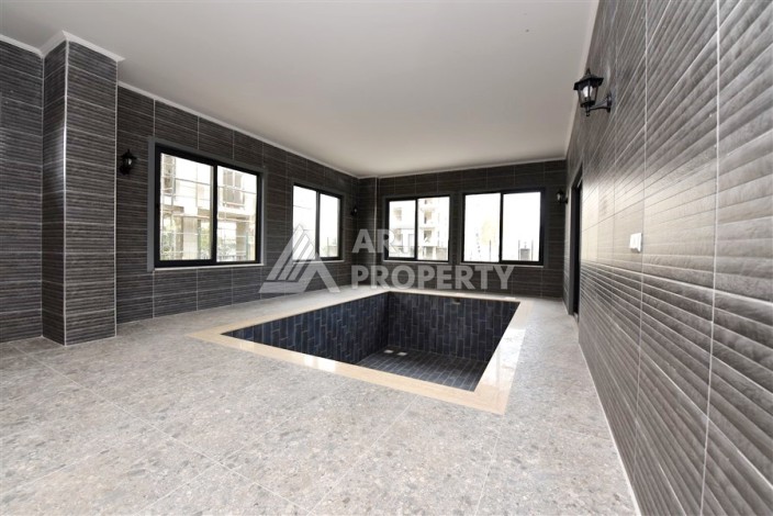 Квартира 1+1 в Махмутларе в новой резиденции, 50 м² - Ракурс 34