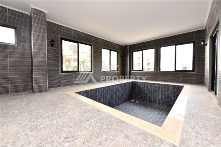 Квартира 1+1 в Махмутларе в новой резиденции, 50 м² - Ракурс 35