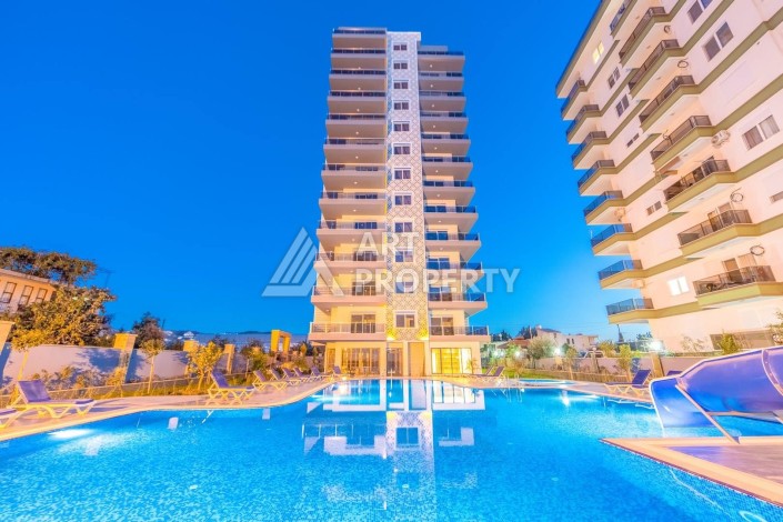 Квартира 1+1 с видом на море в Махмутларе, 65 м² - Ракурс 2