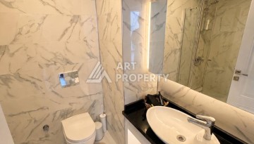 Квартира 1+1 с видом на море в Махмутларе, 65 м² - Ракурс 13