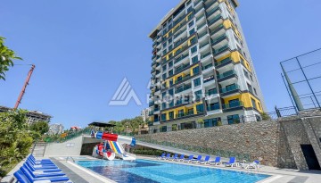Квартира 1+1 - 50 м² в современной резиденции в Махмутларе - Ракурс 1