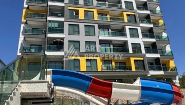 Квартира 1+1 - 50 м² в современной резиденции в Махмутларе - Ракурс 2
