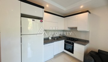 Квартира 1+1 - 50 м² в современной резиденции в Махмутларе - Ракурс 5