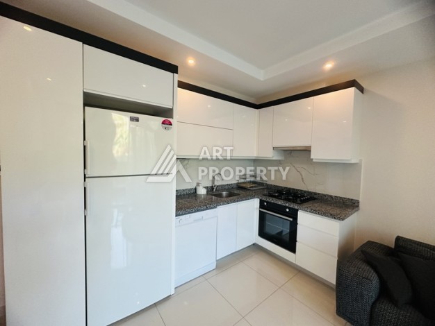 Квартира 1+1 - 50 м² в современной резиденции в Махмутларе - Ракурс 4