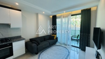 Квартира 1+1 - 50 м² в современной резиденции в Махмутларе - Ракурс 6