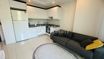 Квартира 1+1 - 50 м² в современной резиденции в Махмутларе - Ракурс 7