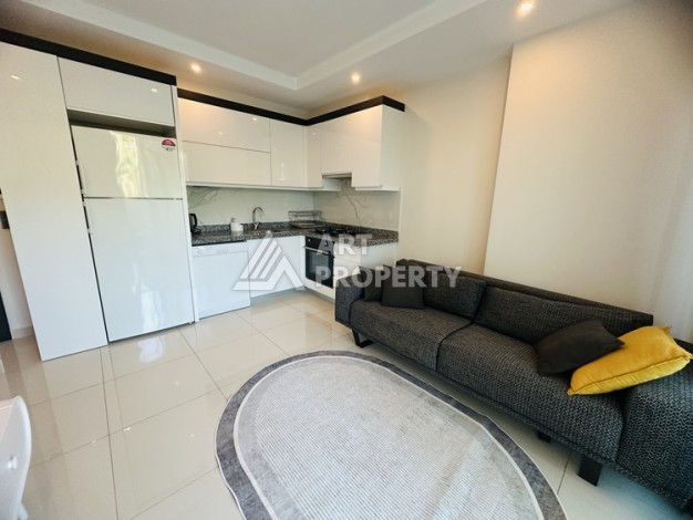 Квартира 1+1 - 50 м² в современной резиденции в Махмутларе - Ракурс 6