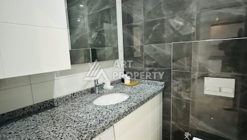 Квартира 1+1 - 50 м² в современной резиденции в Махмутларе - Ракурс 11