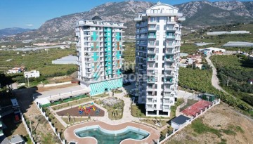Квартира 1+1 60 м² в ЖК с инфраструктурой отельного типа в Махмутларе - Ракурс 1