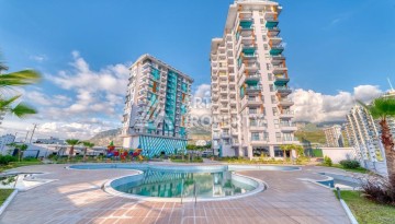 Квартира 1+1 60 м² в ЖК с инфраструктурой отельного типа в Махмутларе - Ракурс 2