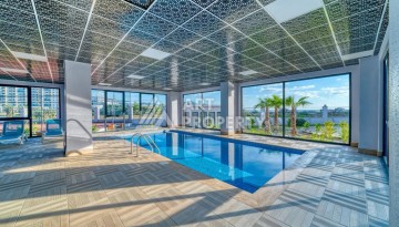 Квартира 1+1 60 м² в ЖК с инфраструктурой отельного типа в Махмутларе - Ракурс 27
