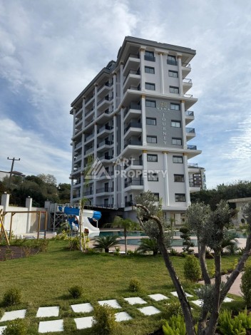 Стильная квартира 1+1 в новом жилом комплексе в Тосмуре, 50 м² - Ракурс 9