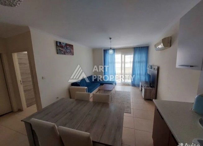 Квартира 1+1 в Махмутларе рядом с рынком и Еkta Mall, 65 м² - Ракурс 1