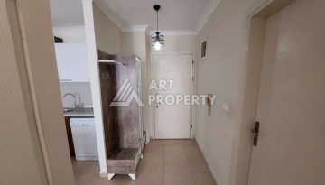 Квартира 1+1 в Махмутларе рядом с рынком и Еkta Mall, 65 м² - Ракурс 3