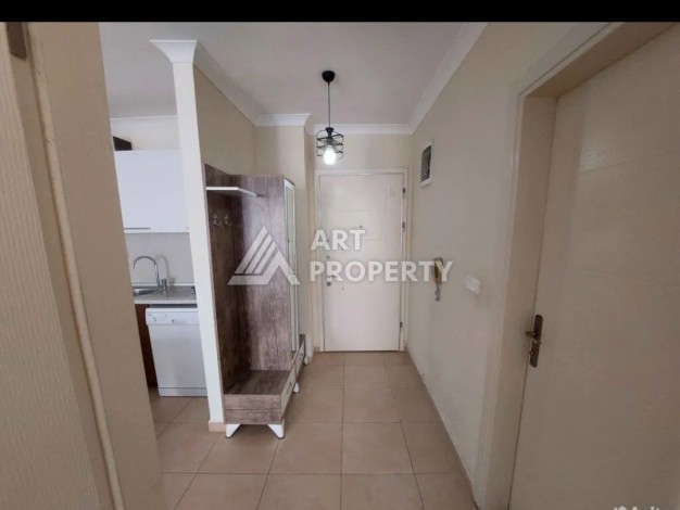 Квартира 1+1 в Махмутларе рядом с рынком и Еkta Mall, 65 м² - Ракурс 2