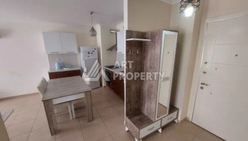 Квартира 1+1 в Махмутларе рядом с рынком и Еkta Mall, 65 м² - Ракурс 4