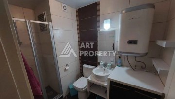 Квартира 1+1 в Махмутларе рядом с рынком и Еkta Mall, 65 м² - Ракурс 8