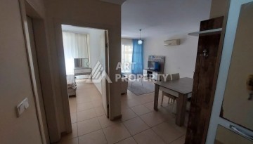 Квартира 1+1 в Махмутларе рядом с рынком и Еkta Mall, 65 м² - Ракурс 12