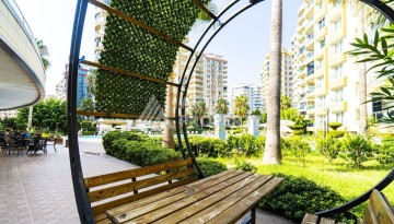 Квартира 1+1 в Махмутларе рядом с рынком и Еkta Mall, 65 м² - Ракурс 21