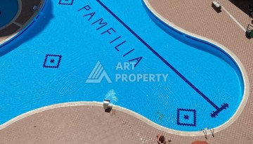Квартира 1+1 в Махмутларе рядом с рынком и Еkta Mall, 65 м² - Ракурс 24