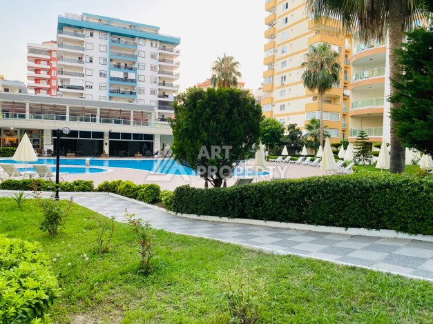Квартира 1+1 в Махмутларе рядом с рынком и Еkta Mall, 65 м² - Ракурс 26