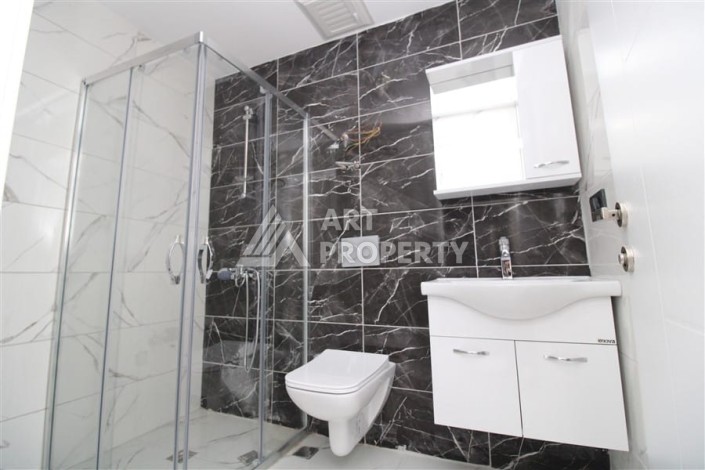 Квартира 1+1 в центре Махмутлара возле субботнего рынка, 50 м² - Ракурс 1