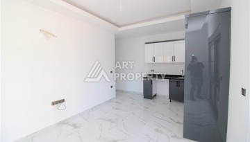 Квартира 1+1 в центре Махмутлара возле субботнего рынка, 50 м² - Ракурс 7