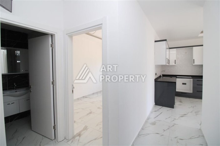 Квартира 1+1 в центре Махмутлара возле субботнего рынка, 50 м² - Ракурс 7