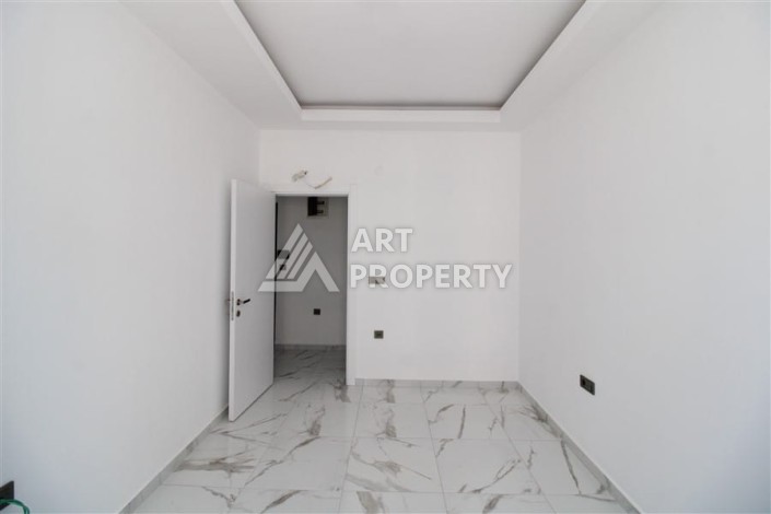 Квартира 1+1 в центре Махмутлара возле субботнего рынка, 50 м² - Ракурс 9
