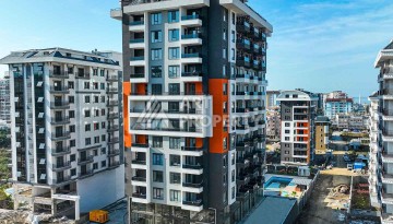Квартира 2+1 в Махмутларе с видом на море, 75 кв.м. - Ракурс 2