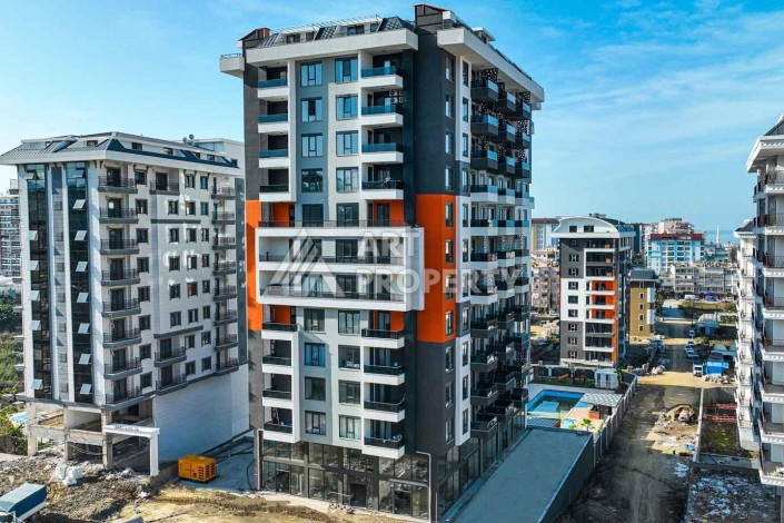 Квартира 2+1 в Махмутларе с видом на море, 75 кв.м. - Ракурс 1