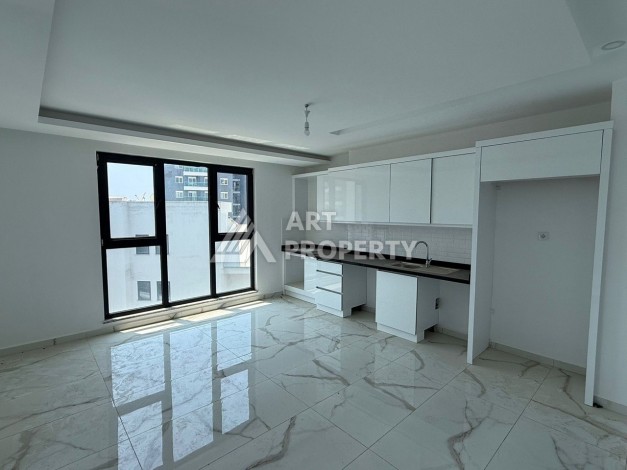 Квартира 2+1 - 85 м² в 5 минутах от вторничного рынка в Махмутларе - Ракурс 3