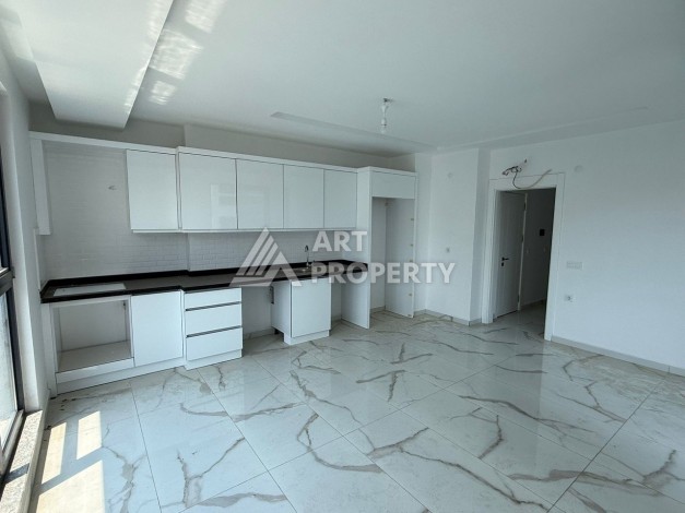 Квартира 2+1 - 85 м² в 5 минутах от вторничного рынка в Махмутларе - Ракурс 6