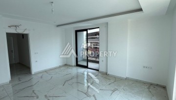 Квартира 2+1 - 85 м² в 5 минутах от вторничного рынка в Махмутларе - Ракурс 12