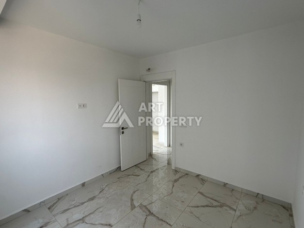 Квартира 2+1 - 85 м² в 5 минутах от вторничного рынка в Махмутларе - Ракурс 18