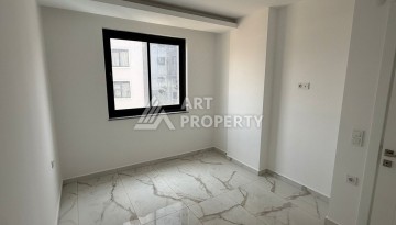 Квартира 2+1 - 85 м² в 5 минутах от вторничного рынка в Махмутларе - Ракурс 20
