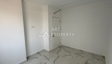 Квартира 2+1 - 85 м² в 5 минутах от вторничного рынка в Махмутларе - Ракурс 21