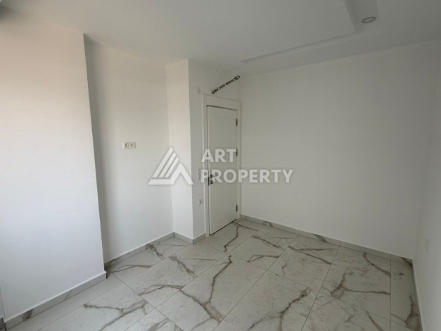 Квартира 2+1 - 85 м² в 5 минутах от вторничного рынка в Махмутларе - Ракурс 20