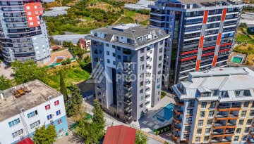 Квартира 2+1 - 85 м² в 5 минутах от вторничного рынка в Махмутларе - Ракурс 28