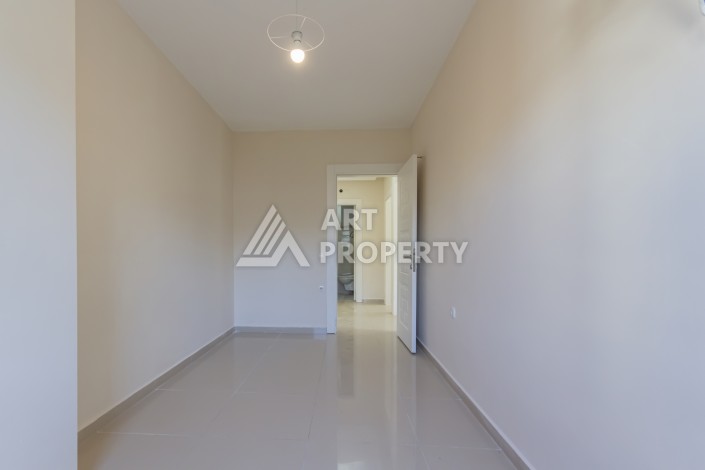 Квартира 2+1 в Махмутларе по выгодной цене, 85 м² - Ракурс 20
