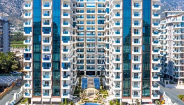 Квартира 1+1 в премиальной резиденции Махмутлара, 70 кв.м. - Ракурс 1
