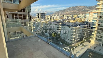 Квартира 1+1 на первой береговой линии в Махмутларе, 65 м² - Ракурс 2
