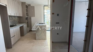 Квартира 1+1 на первой береговой линии в Махмутларе, 65 м² - Ракурс 5