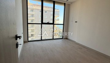 Квартира 1+1 на первой береговой линии в Махмутларе, 65 м² - Ракурс 7