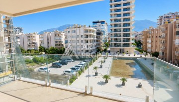 Квартира 1+1 в Махмутларе на первой береговой линии, 55 м² - Ракурс 1