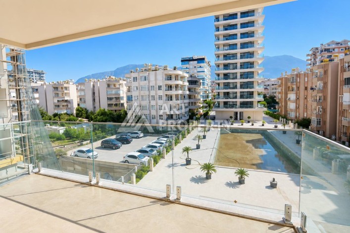 Квартира 1+1 в Махмутларе на первой береговой линии, 55 м² - Ракурс 0